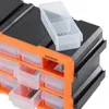 A close-up view of an orange and black storage organizer with multiple clear drawers, with one drawer removed and placed on top. Produktbild-Vorschau