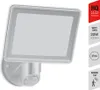 A product shot of a white LED floodlight with a motion sensor, set against a white background. Informational graphics are present on the right side. Produktbild-Vorschau