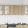 A kitchen scene with upper cabinets and a countertop with appliances and dishes. Produktbild-Vorschau