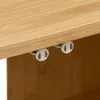 A close-up view of the underside of a wooden shelf with two small white rollers attached. Produktbild-Vorschau