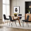 A dining room scene with a table and chairs. Produktbild-Vorschau