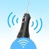 A black and silver electric water flosser is shown against a gradient blue and white background, with blue wavy lines indicating wireless connectivity and a blue circle with a Wi-Fi symbol at the bottom. Voir les images du produit
