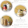 Collage of images showing glass jars filled with food items and text describing product features. Produktbild-Vorschau