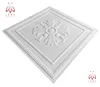 A white, three-dimensional wall panel with a decorative floral pattern in the center, presented at an angle on a white background. Produktbild-Vorschau