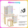 A diagram showing the dimensions and weight capacity of a white and gold vanity table with a stool and a power adapter. Anteprima dell’immagine prodotto