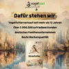 A bag of birdseed with a scenic mountain and forest background. Produktbild-Vorschau