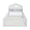 A white wooden children's bed with a house-shaped headboard and built-in shelves. Náhľad obrázku produktu