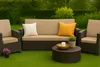 Outdoor furniture set on a green lawn with a hedge in the background. Podgląd zdjęcia produktu