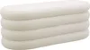 A cream-colored upholstered bench with a rounded, layered design. Produktbild-Vorschau