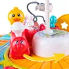 A close-up view of a colorful children's interactive music toy, featuring a train, duck, and rabbit. Produktbild-Vorschau