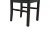 Close-up view of the legs and lower frame of a black chair. Produktbild-Vorschau