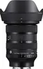 A close-up studio shot of a black camera lens with its lens hood attached. Anteprima dell’immagine prodotto