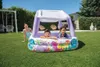Piscine gonflable pour enfants dans le jardin avec abri Voir les images du produit 36