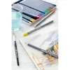 A watercolor painting setup with colored pencils, a glass of water, and a paintbrush. Produktbild-Vorschau