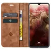 A brown leather flip case for a smartphone, with cards and banknotes inserted. Produktbild-Vorschau