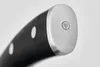A close-up shot of the handle of a knife. Voir les images du produit