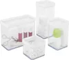 A set of clear plastic storage containers with white lids, filled with various cosmetic and personal care items. Produktbild-Vorschau