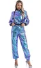 A woman is modeling a metallic jumpsuit. Produktbild-Vorschau