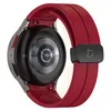 The back of a smartwatch with a red strap is shown against a white background. Produktbild-Vorschau