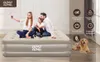 A family and a dog are on an air mattress in a room. Produktbild-Vorschau