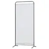 A tall, rectangular room divider with a white fabric panel and a black metal frame, standing on a white background. Náhľad obrázku produktu