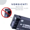 A close-up of a black ink cartridge with a warning symbol and German text. Produktbild-Vorschau