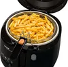 A close-up shot of a black Tefal deep fryer filled with French fries. Náhled obrázku produktu