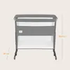 A gray and white baby crib with dimensions indicated. Náhľad obrázku produktu