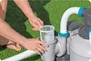 A person is shown inserting a filter basket into a pool pump system. Produktbild-Vorschau