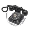 A black retro rotary dial telephone is shown from a slightly elevated side angle, with dimensions indicated by white text and lines. Podgląd zdjęcia produktu