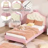 A pink children's bed with a tufted headboard and LED lighting, surrounded by detail shots of its features. Anteprima dell’immagine prodotto