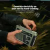 Hands holding a green emergency radio in an outdoor, natural setting. Produktbild-Vorschau
