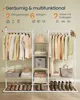 A SONGMICS HOME open wardrobe with clothes hanging and items on shelves. Produktbild-Vorschau