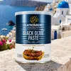 Latrovalis Schwarze Olivenpaste 840 g Dose vor Santorini-Kulisse Produktbild-Vorschau