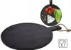 A black round cutting board with a handle, shown with a smaller cutting board in the background displaying food items. Anteprima dell’immagine prodotto