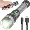 A hand holding a flashlight and a separate flashlight with cables. Produktbild-Vorschau