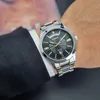 A person wearing a suit and a Casio watch. Podgląd zdjęcia produktu