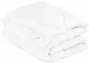 A white comforter and two pillows are folded and stacked on a white background. Podgląd zdjęcia produktu