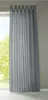 A gray curtain hanging in front of a window. Produktbild-Vorschau