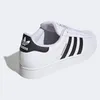 A side view of a white Adidas Superstar II sneaker with black accents. Produktbild-Vorschau
