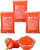 A collage of three bags of strawberry popping boba mix and a bowl of popping boba with strawberries. Produktbild-Vorschau