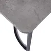 A close-up view of the corner of a table with a marble-like grey surface and black metal legs. Produktbild-Vorschau