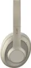 A close-up, studio shot of a pair of sand-colored wireless headphones. Anteprima dell’immagine prodotto