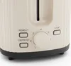 Close-up of the control panel of a cream-colored toaster. Náhľad obrázku produktu