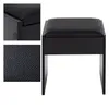 A black upholstered stool with a wooden frame, shown against a white background. Inset images show a close-up of the stool's corner and the texture of the faux leather. Produktbild-Vorschau
