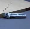 A close-up shot of a woodworking tool shaving a piece of wood. Produktbild-Vorschau