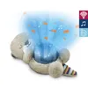 A plush otter toy projecting a blue light with fish and musical notes. Produktbild-Vorschau