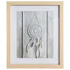 A framed picture of a dreamcatcher hanging on a wooden background. Produktbild-Vorschau