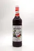 A bottle of Monin Grenadine syrup against a white background. Anteprima dell’immagine prodotto