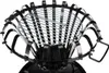 A close-up view of a black metal fire pit with a grill grate. Produktbild-Vorschau